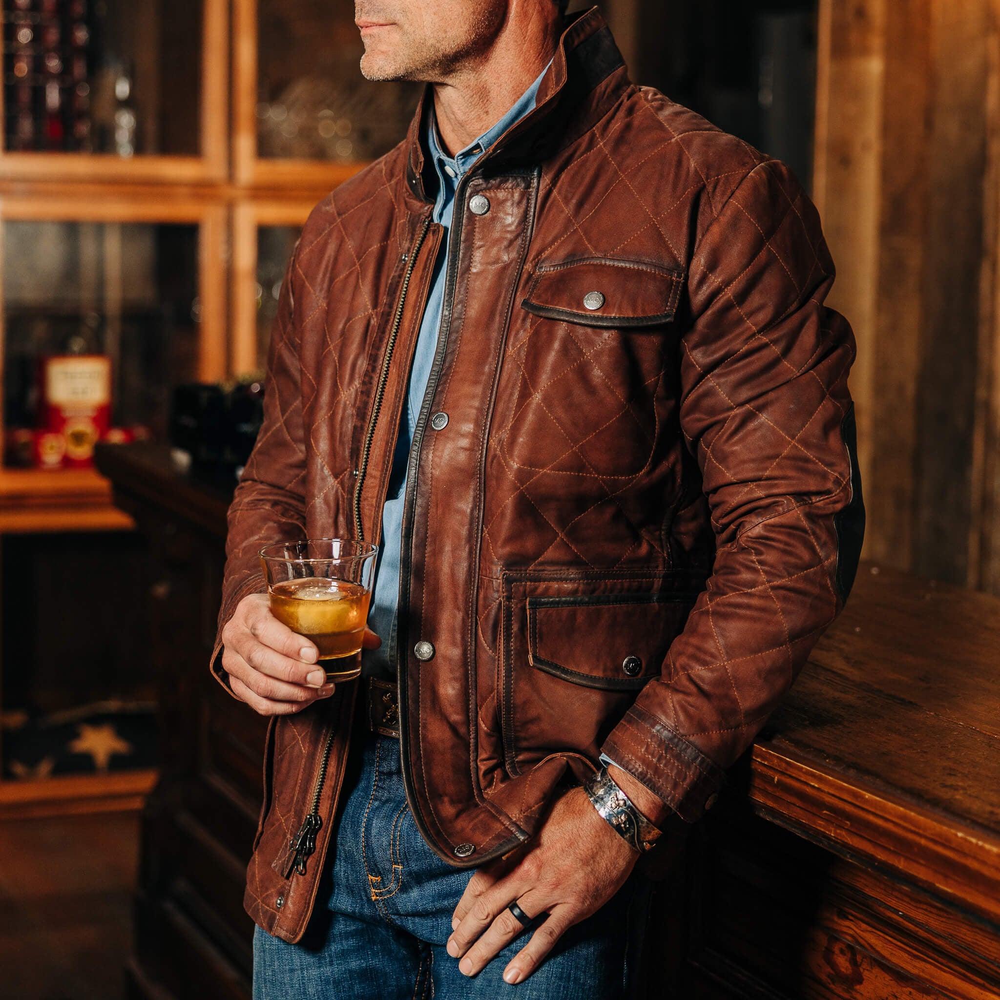 sedona-waxed-suede-leather-jacket-bourbon-front-on-model-detail_5000x